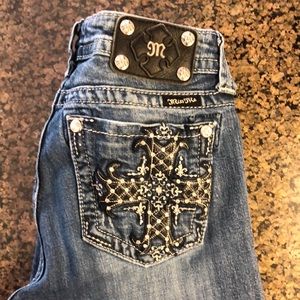 Miss Me Jeans bootcut in gently used condition with cross on back pocket.